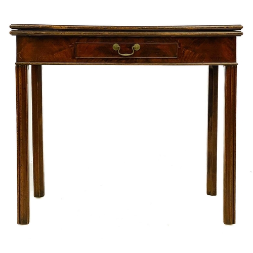 647 - A George III mahogany fold-top tea table. Fitted a single frieze drawer, on moulded square legs, hei... 