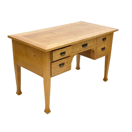 656 - A satin birch and bird's eye maple writing table. Continental, circa 1910, fitted with five kneehole... 