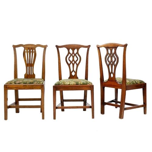 657 - A set of three George III mahogany dining chairs. With pierced splat backs, drop-in seats on square ... 