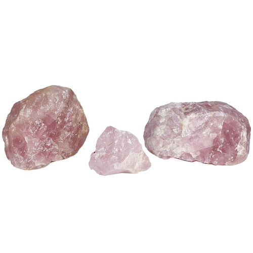 67 - Three rose quartz specimens. The largest is 15cm x 12cm x 8cm, Combined weight is 2.4kg. (3).