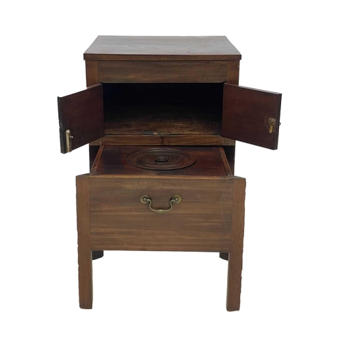 673 - A George III mahogany nightstand. Fitted two doors above a pull-out drawer, height 74cm, width 49.5c... 