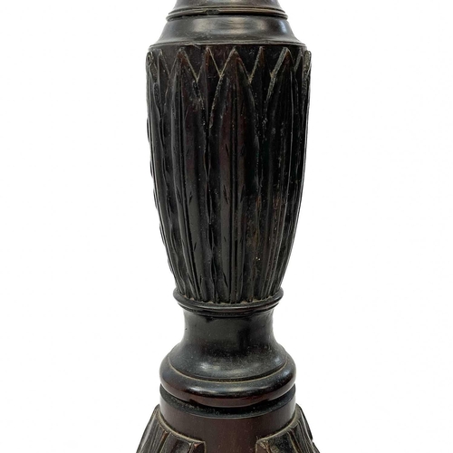 683 - A very tall 19th century mahogany carved torchiere. Decorated with acanthus leaves with a reeded col... 