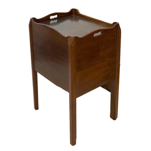 691 - A George III mahogany and inlaid tray top nightstand. Fitted with two doors, above a pull-out lower ... 