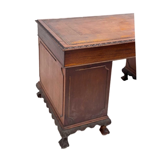 692 - A Georgian style mahogany twin pedestal free standing writing desk. Early 20th century, with inset l... 