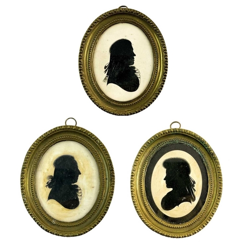 7 - A group of three painted silhouettes by George Bingham, Manchester. Circa 1800, two retaining origin... 