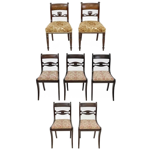 703 - A set of five Regency mahogany dining chairs. With carved mid-rails on sabre front legs, together wi... 