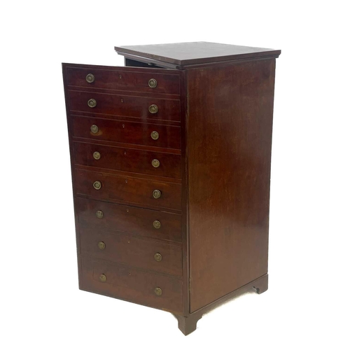 714 - An unusual late Victorian mahogany cupboard or low wardrobe. Fashioned as a tall straight front ches... 