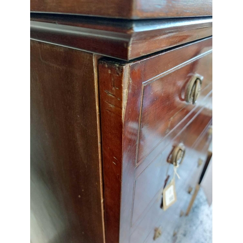 714 - An unusual late Victorian mahogany cupboard or low wardrobe. Fashioned as a tall straight front ches... 