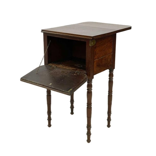 715 - An unusual William IV mahogany bedside table. Fitted one real and a sham flap, which lowers by pushi... 