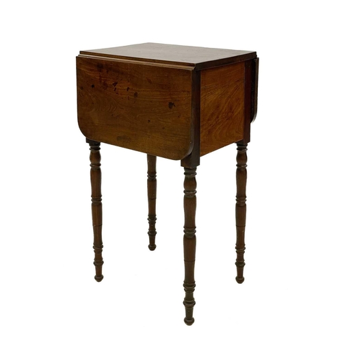 715 - An unusual William IV mahogany bedside table. Fitted one real and a sham flap, which lowers by pushi... 