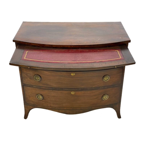 718 - A late George III mahogany bow front chest. Fitted with a brushing slide above three long drawers, o... 