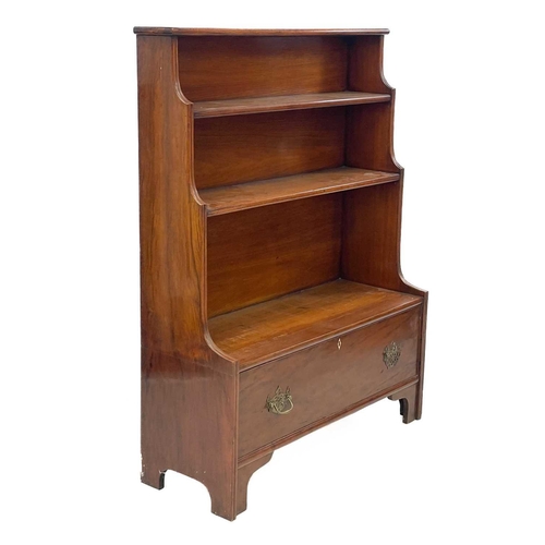 721 - A late George III mahogany waterfall bookcase. Fitted with a lower drawer, on bracket feet, height 1... 