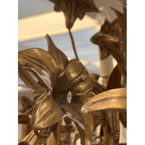 731 - A gilt metal six branch chandelier. Mid-century, possibly Italian, the scrolling branches mounted wi... 