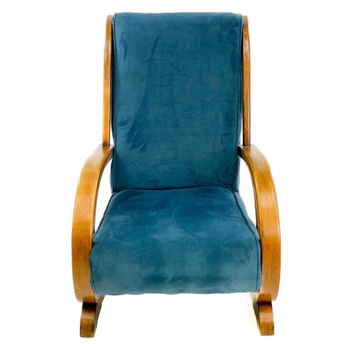 734 - A mid-century stained beech and upholstered Suparest armchair. With an Art Deco style swept frame an... 