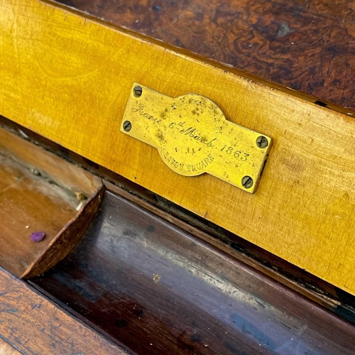 739 - A Victorian burr walnut twin pedestal writing desk. The superstructure with gilt metal gallery and f... 