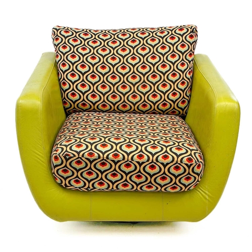 747 - A lime green leatherette and upholstered swivel chair by Rondo. Label to base, height 72cm width 97c... 