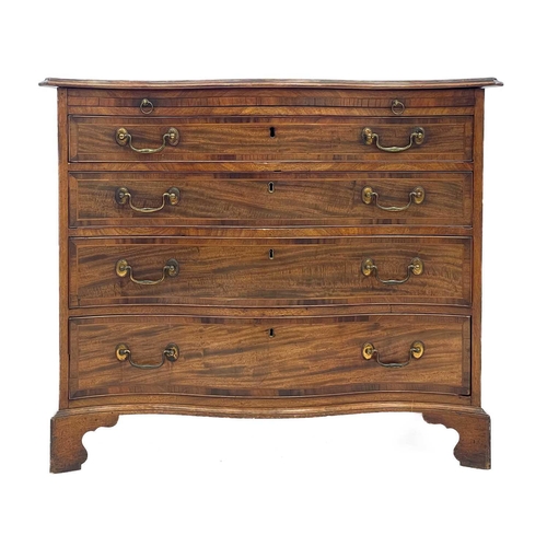 750 - A George III mahogany serpentine front chest. Fitted with four graduated long drawers below a brushi... 