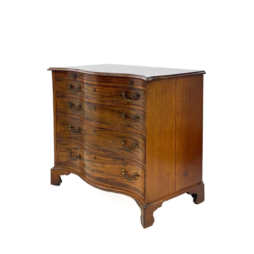 750 - A George III mahogany serpentine front chest. Fitted with four graduated long drawers below a brushi... 