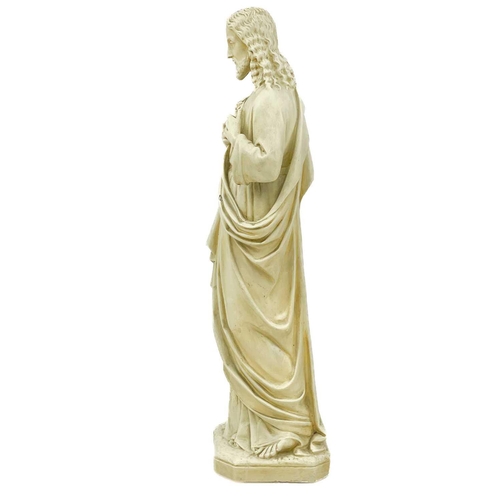 79 - A cast plaster statue of Jesus. Height 86cm.