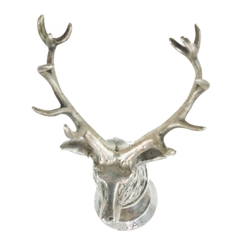 80 - A chrome plated stag car mascot. The circular base stamped HCA & AC, height 15cm.