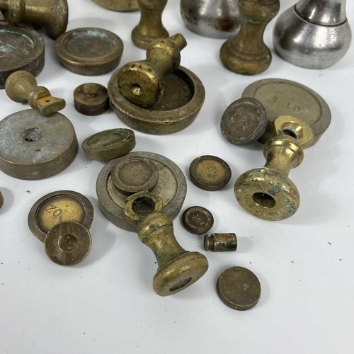 83 - A collection of various brass postal weights. Together with other weights.