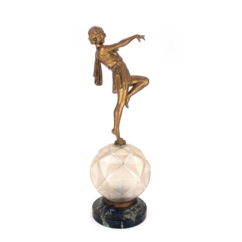 9 - An Art Deco cast spelter figural table lamp. Modelled as a seated female on a marble plinth base, he... 