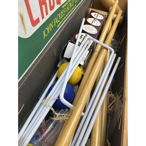 96 - A Jaques lawn croquet set In box. There are four mallets, and four balls, The mallet heads have not ... 