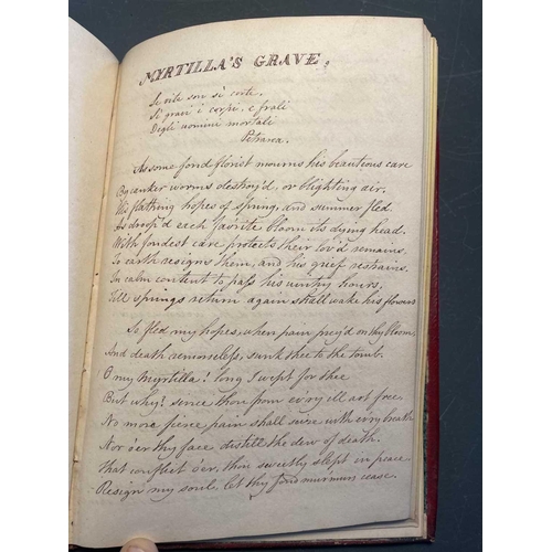 75 - (Penmanship and poetry) Early 19th century note book. Full maroon leather with envelope clasp, 25 pa... 