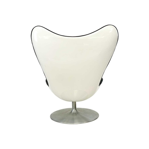 107 - Sir Terence Conran, a glove chair. Designed in 2002, white fibreglass, black leather and spun alumin... 