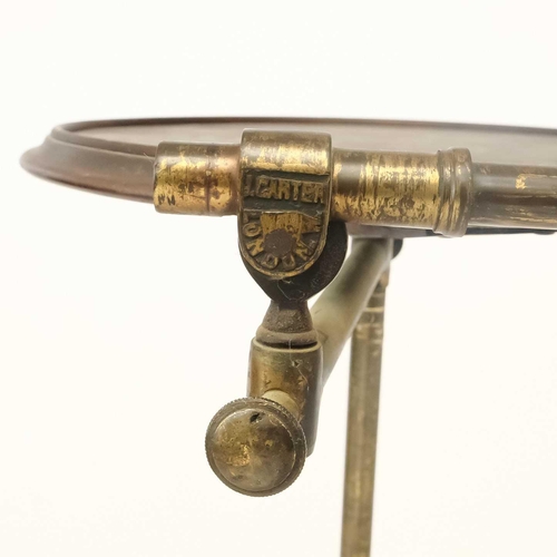 118 - A John Carter's Patent Literary Machine With brass adjustable support on four legs terminating in pa... 