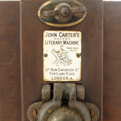 118 - A John Carter's Patent Literary Machine With brass adjustable support on four legs terminating in pa... 