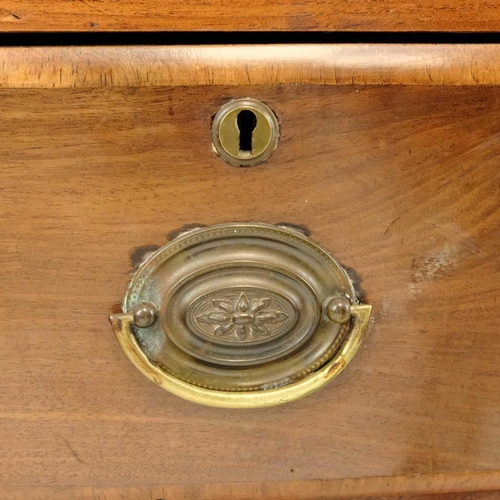 15 - A 19th century mahogany bow front chest of drawers. With two short and two long drawers raised on ba... 