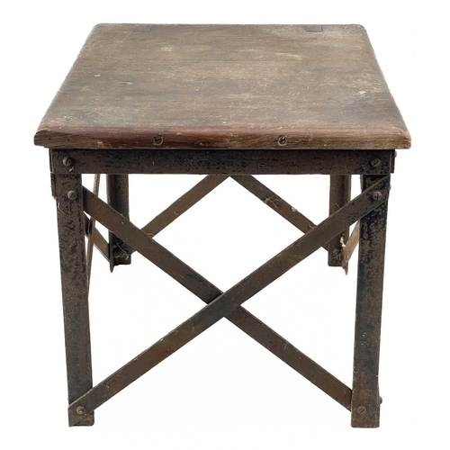 16 - An early 20th century oak stool. With iron strap work frame base, height 32cm width 34cm depth 33.5c... 