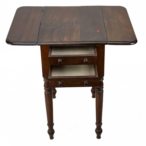 21 - A Victorian mahogany drop leaf work table With two drawers and two dummy drawers on tapering turned ... 