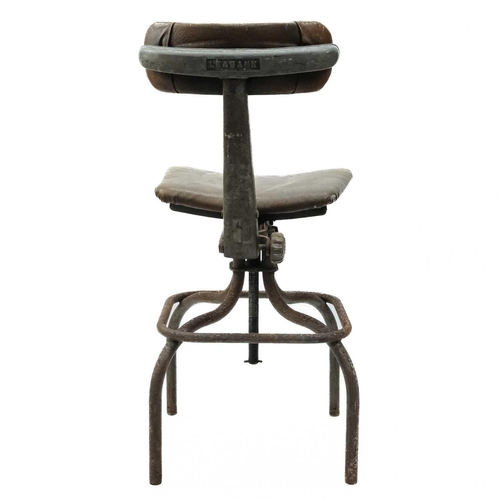 3 - A mid century machinist swivel chair by Leabank. With a leatherette seat and back on a steel tubular... 