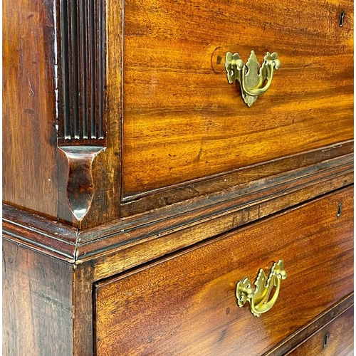 35 - A George III mahogany chest on chest. With a dentil cornice above two short and three long drawers, ... 