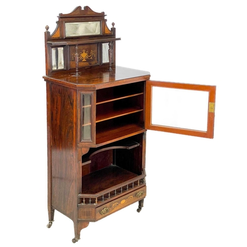 40 - An Edwardian rosewood inlaid music cabinet. With a mirrored gallery back above a single glazed cupbo... 