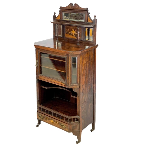 40 - An Edwardian rosewood inlaid music cabinet. With a mirrored gallery back above a single glazed cupbo... 