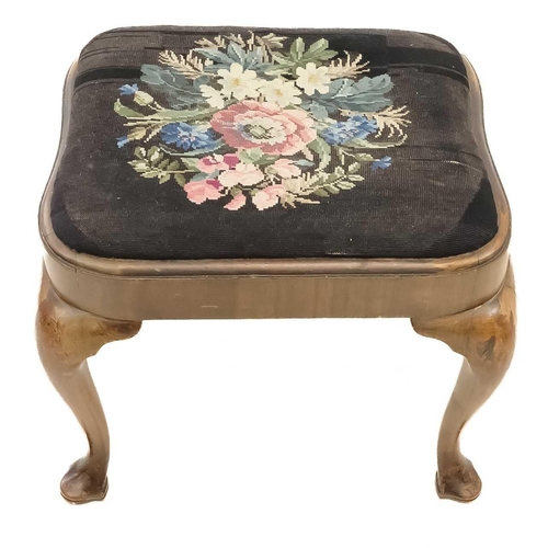 45 - A George II walnut stool. With embroidered drop-in seat, and raised on cabriole legs with trefoil sh... 