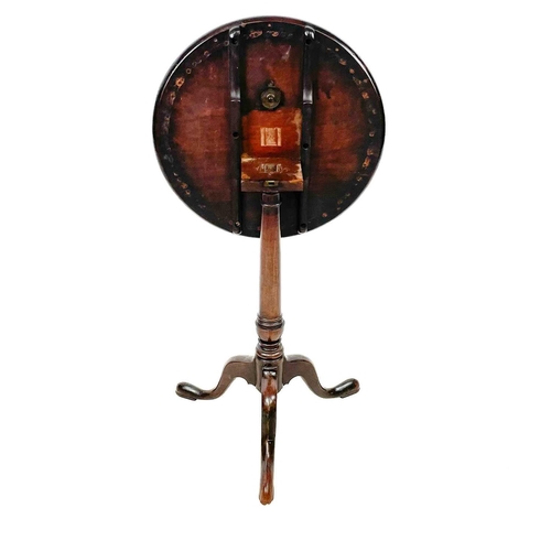 48 - A George III mahogany circular tilt top occasional table. Raised on a turned pillar and tripod base,... 