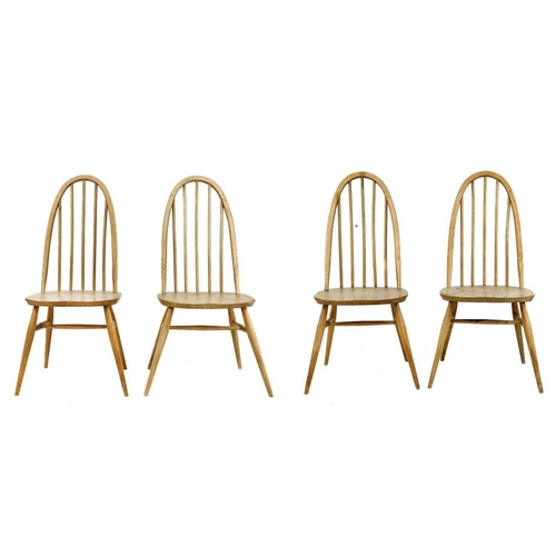 51 - Four light oak hoop back Ercol chairs With tapering turned supports. (4) Heavy wear, staining and sc... 