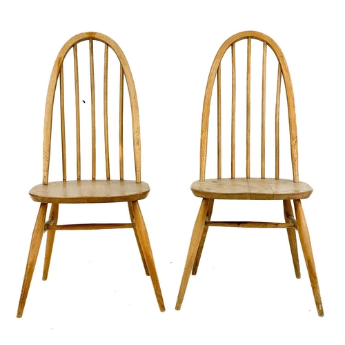 51 - Four light oak hoop back Ercol chairs With tapering turned supports. (4) Heavy wear, staining and sc... 