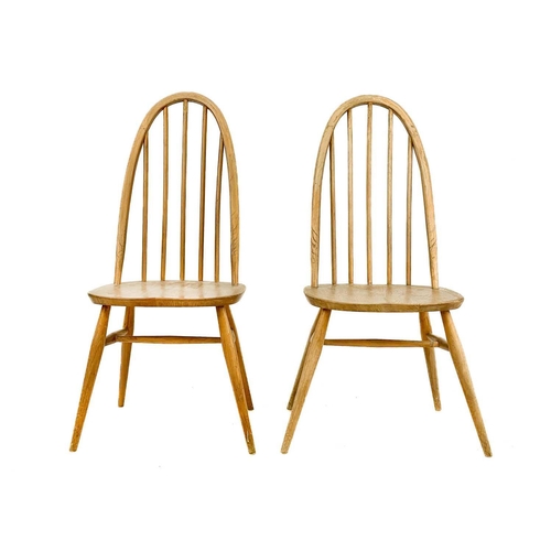 51 - Four light oak hoop back Ercol chairs With tapering turned supports. (4) Heavy wear, staining and sc... 