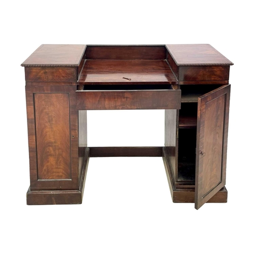 79 - A Regency mahogany and line inlaid small pedestal sideboard. With reel moulded borders, recessed cen... 