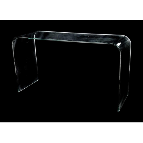 84 - A contemporary curved glass console table. Height 69cm width 126cm depth 43cm. Some light surface sc... 