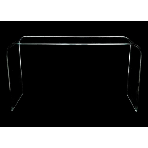 84 - A contemporary curved glass console table. Height 69cm width 126cm depth 43cm. Some light surface sc... 