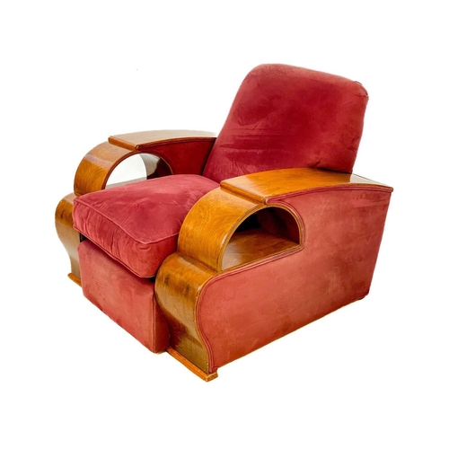 85 - An Art Deco walnut veneer upholstered three piece suite. Comprising: a three seater and two armchair... 