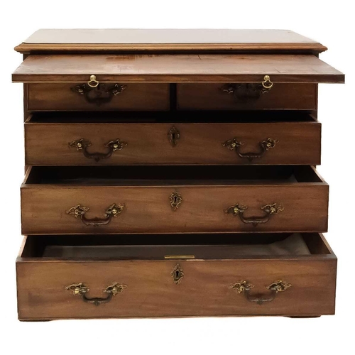 96 - A George III mahogany small chest. Fitted a brushing slide above two short and three long drawers wi... 