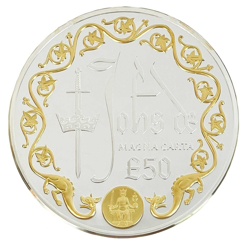 114 - Cased 10 ounce (311 gms) 2015 Guernsey £50 proof silver and 24 carat gold plated coin An attractive ... 