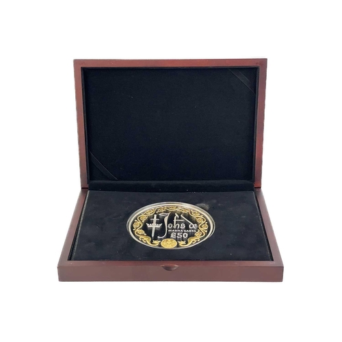 114 - Cased 10 ounce (311 gms) 2015 Guernsey £50 proof silver and 24 carat gold plated coin An attractive ... 